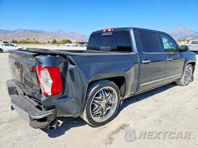 Trzecie zdjęcie samochodu z tyłu: 2017 CHEVROLET SILVERADO C1500 LTZ VIN:3GCPCSEC8HG373881 - miniatura