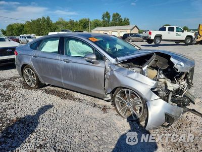 Czwarte zdjęcie samochodu z boku: 2020 FORD FUSION TITANIUM VIN:3FA6P0D91LR152118 - miniatura