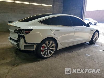 Trzecie zdjęcie samochodu z tyłu: 2018 TESLA MODEL 3 VIN:5YJ3E1EB8JF106570 - miniatura