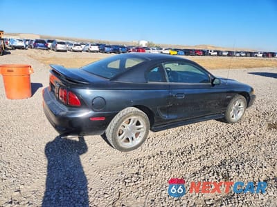 Trzecie zdjęcie samochodu z tyłu: 1998 FORD MUSTANG GT VIN:1FAFP42X7WF195663 - miniatura