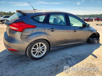 Trzecie zdjęcie samochodu z tyłu: 2018 FORD FOCUS SE VIN:1FADP3K29JL329539 - miniatura