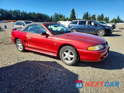 Czwarte zdjęcie samochodu z boku: 1998 FORD MUSTANG VIN:1FAFP4446WF216683 - miniatura