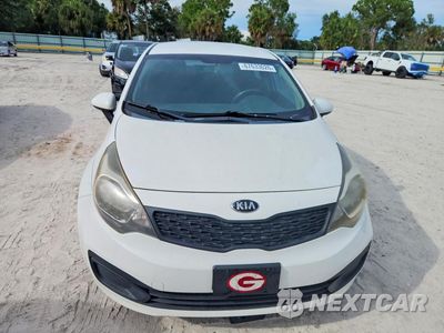 Piąte zdjęcie samochodu w środku: 2014 KIA RIO LX VIN:KNADM4A32E6360670 - miniatura