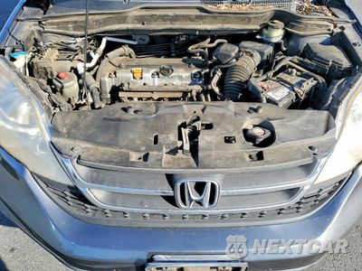 Zdjęcie 12 z 13 samochodu: 2010 HONDA CR-V LX VIN:JHLRE3H30AC009101 - miniatura