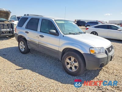 Czwarte zdjęcie samochodu z boku: 2007 FORD ESCAPE XLT VIN:1FMYU03167KA39018 - miniatura