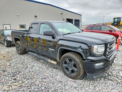 Czwarte zdjęcie samochodu z boku: 2018 GMC SIERRA K1500 SLE VIN:1GTV2MEC9JZ200009 - miniatura