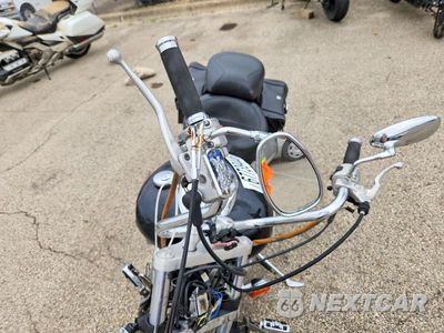 Piąte zdjęcie samochodu w środku: 2004 YAMAHA XVS1100 A VIN:JYAVP11Y44A006861 - miniatura
