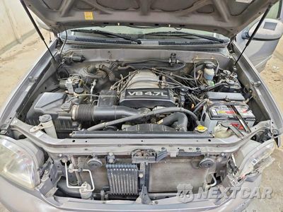 Zdjęcie 11 z 13 samochodu: 2000 TOYOTA TUNDRA ACCESS CAB LIMITED VIN:5TBRT3818YS055519 - miniatura