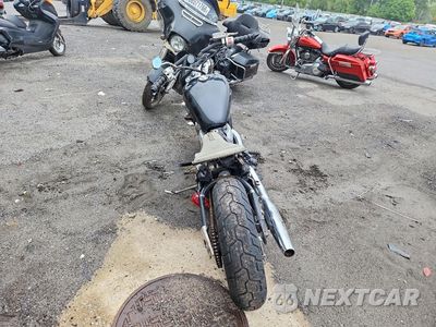 Czwarte zdjęcie samochodu z boku: 1994 HONDA VT600 C VIN:JH2PC2104RM502247 - miniatura