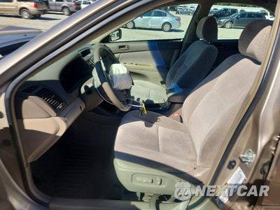 Zdjęcie 7 z 13 samochodu: 2004 TOYOTA CAMRY LE V6 VIN:4T1BF32K44U066570 - miniatura