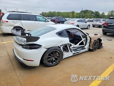 Trzecie zdjęcie samochodu z tyłu: 2024 PORSCHE CAYMAN GT4 VIN:WP0ZZZ986RK299750 - miniatura