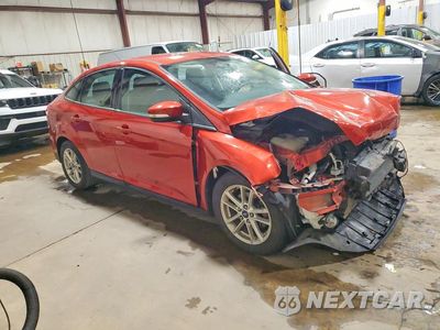 Czwarte zdjęcie samochodu z boku: 2018 FORD FOCUS SE VIN:1FADP3F24JL307118 - miniatura