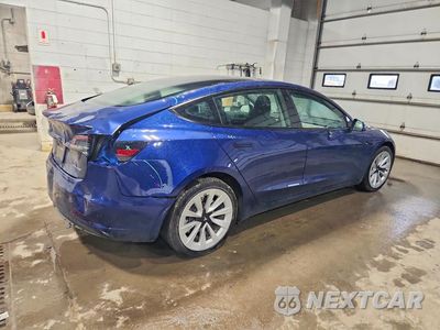 Trzecie zdjęcie samochodu z tyłu: 2023 TESLA MODEL 3 VIN:5YJ3E1EB1PF596486 - miniatura