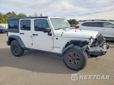 Czwarte zdjęcie samochodu z boku: 2017 JEEP WRANGLER UNLIMITED SPORT VIN:1C4HJWDG7HL542104 - miniatura