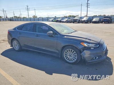 Czwarte zdjęcie samochodu z boku: 2016 FORD FUSION SE HYBRID VIN:3FA6P0LU4GR388791 - miniatura