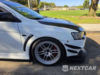 Zdjęcie 9 z 15 samochodu: 2011 MITSUBISHI LANCER EVOLUTION MR VIN:JA32W5FV7BU018500 - miniatura