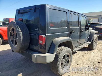 Trzecie zdjęcie samochodu z tyłu: 2012 JEEP WRANGLER UNLIMITED SAHARA VIN:1C4BJWEG7CL255536 - miniatura