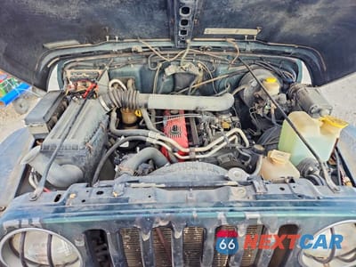 Zdjęcie 12 z 13 samochodu: 2000 JEEP WRANGLER SAHARA VIN:1J4FA59S8YP728946 - miniatura