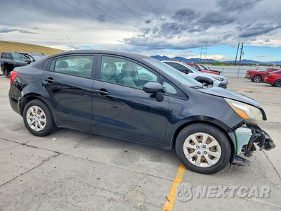 Czwarte zdjęcie samochodu z boku: 2014 KIA RIO LX VIN:KNADM4A32E6384175 - miniatura