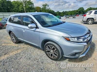 Czwarte zdjęcie samochodu z boku: 2016 MITSUBISHI OUTLANDER SE VIN:JA4AD3A37GZ034729 - miniatura