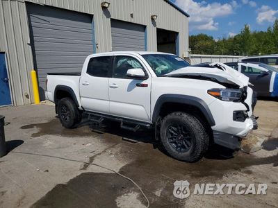 Czwarte zdjęcie samochodu z boku: 2020 TOYOTA TACOMA TRD PRO VIN:5TFCZ5AN0LX232782 - miniatura