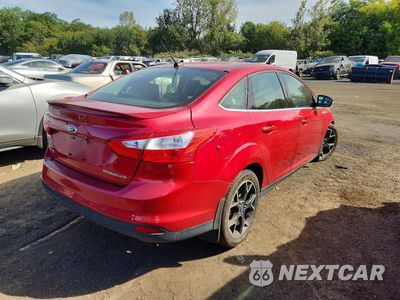 Trzecie zdjęcie samochodu z tyłu: 2012 FORD FOCUS TITANIUM VIN:1FAHP3J20CL219145 - miniatura