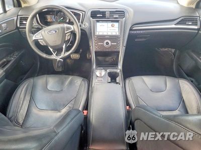 Zdjęcie 8 z 12 samochodu: 2017 FORD FUSION TITANIUM HEV VIN:3FA6P0RU8HR232813 - miniatura
