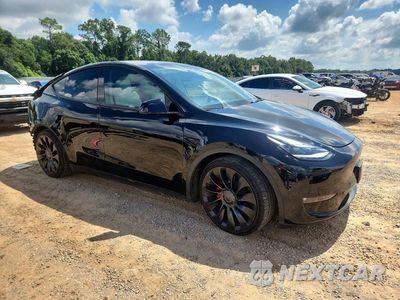 Czwarte zdjęcie samochodu z boku: 2023 TESLA MODEL Y VIN:7SAYGDEF5PF870182 - miniatura