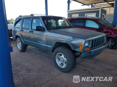 Czwarte zdjęcie samochodu z boku: 2000 JEEP CHEROKEE SPORT VIN:1J4FF48S1YL102403 - miniatura