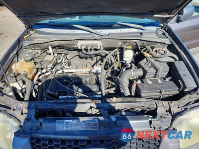 Zdjęcie 12 z 13 samochodu: 2006 FORD ESCAPE XLS VIN:1FMYU02Z56KC12579 - miniatura