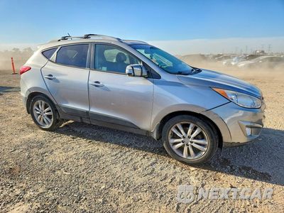 Czwarte zdjęcie samochodu z boku: 2012 HYUNDAI TUCSON LIMITED VIN:KM8JUCAC9CU382721 - miniatura