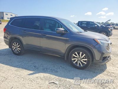 Czwarte zdjęcie samochodu z boku: 2020 HONDA PILOT EXL VIN:5FNYF5H52LB026104 - miniatura