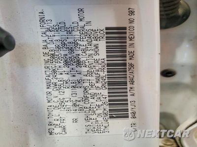 Zdjęcie 12 z 12 samochodu: 2013 TOYOTA TACOMA V6 VIN:3TMLU4EN0DM126147 - miniatura