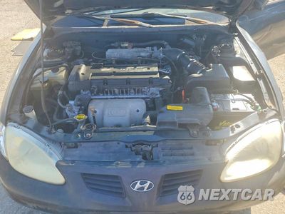 Zdjęcie 11 z 13 samochodu: 2000 HYUNDAI ELANTRA GLS VIN:KMHJF35F5YU971254 - miniatura