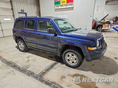 Czwarte zdjęcie samochodu z boku: 2014 JEEP PATRIOT SPORT VIN:1C4NJRBB2ED898235 - miniatura