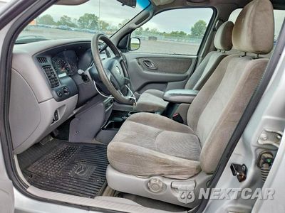Zdjęcie 7 z 12 samochodu: 2002 MAZDA TRIBUTE LX VIN:4F2YU08132KM12067 - miniatura