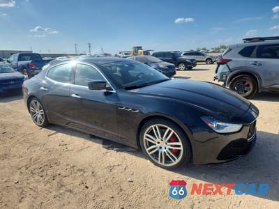Czwarte zdjęcie samochodu z boku: 2014 MASERATI GHIBLI S VIN:ZAM57RTA2E1117781 - miniatura