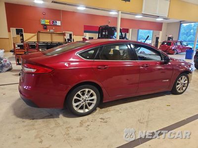 Trzecie zdjęcie samochodu z tyłu: 2019 FORD FUSION SE VIN:3FA6P0LU5KR192092 - miniatura