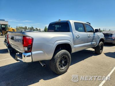 Trzecie zdjęcie samochodu z tyłu: 2019 TOYOTA TACOMA SR5 VIN:5TFAX5GN6KX163745 - miniatura