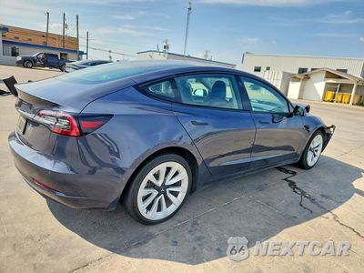 Trzecie zdjęcie samochodu z tyłu: 2022 TESLA MODEL 3 VIN:5YJ3E1EA0NF376387 - miniatura