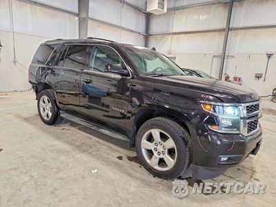 Czwarte zdjęcie samochodu z boku: 2015 CHEVROLET TAHOE K1500 LT VIN:1GNSKBKC9FR113608 - miniatura