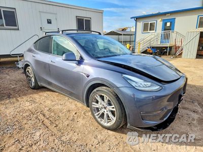 Czwarte zdjęcie samochodu z boku: 2023 TESLA MODEL Y VIN:7SAYGDEE8PA108937 - miniatura