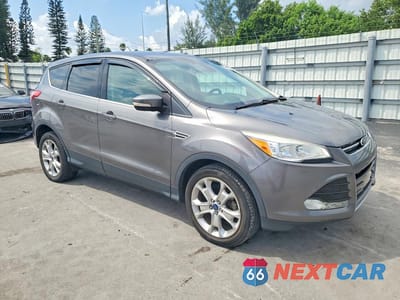 Czwarte zdjęcie samochodu z boku: 2013 FORD ESCAPE SEL VIN:1FMCU0HX2DUC99259 - miniatura