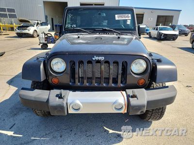 Piąte zdjęcie samochodu w środku: 2013 JEEP WRANGLER UNLIMITED SAHARA VIN:1C4BJWEG8DL668129 - miniatura