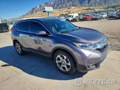 Czwarte zdjęcie samochodu z boku: 2017 HONDA CR-V EXL VIN:7FARW1H85HE046589 - miniatura
