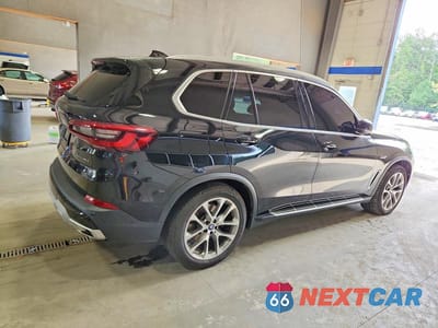Trzecie zdjęcie samochodu z tyłu: 2023 BMW X5 XDRIVE45E VIN:5UXTA6C03P9P61229 - miniatura