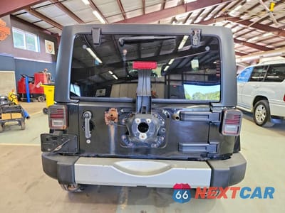 Zdjęcie 6 z 12 samochodu: 2012 JEEP WRANGLER UNLIMITED SAHARA VIN:1C4BJWEG9CL134538 - miniatura