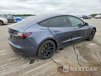 Trzecie zdjęcie samochodu z tyłu: 2022 TESLA MODEL 3 VIN:5YJ3E1EB4NF252342 - miniatura