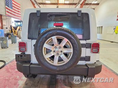 Zdjęcie 6 z 12 samochodu: 2018 JEEP WRANGLER UNLIMITED SAHARA VIN:1C4BJWEGXJL836767 - miniatura