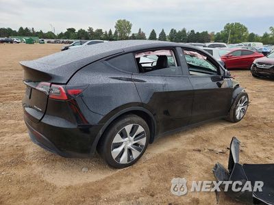 Trzecie zdjęcie samochodu z tyłu: 2023 TESLA MODEL Y VIN:7SAYGDEE9PF828072 - miniatura